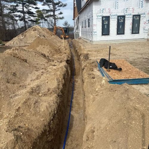 Installed an underground sewer and water tap in Lake Orion MI.